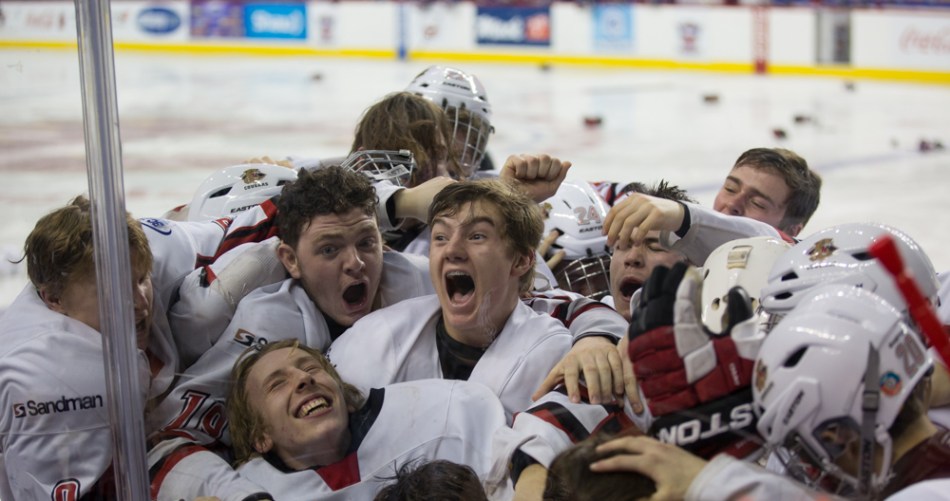 Cariboo Cougars players celebrate their winning goal in overtime. © J. Ashley Nixon