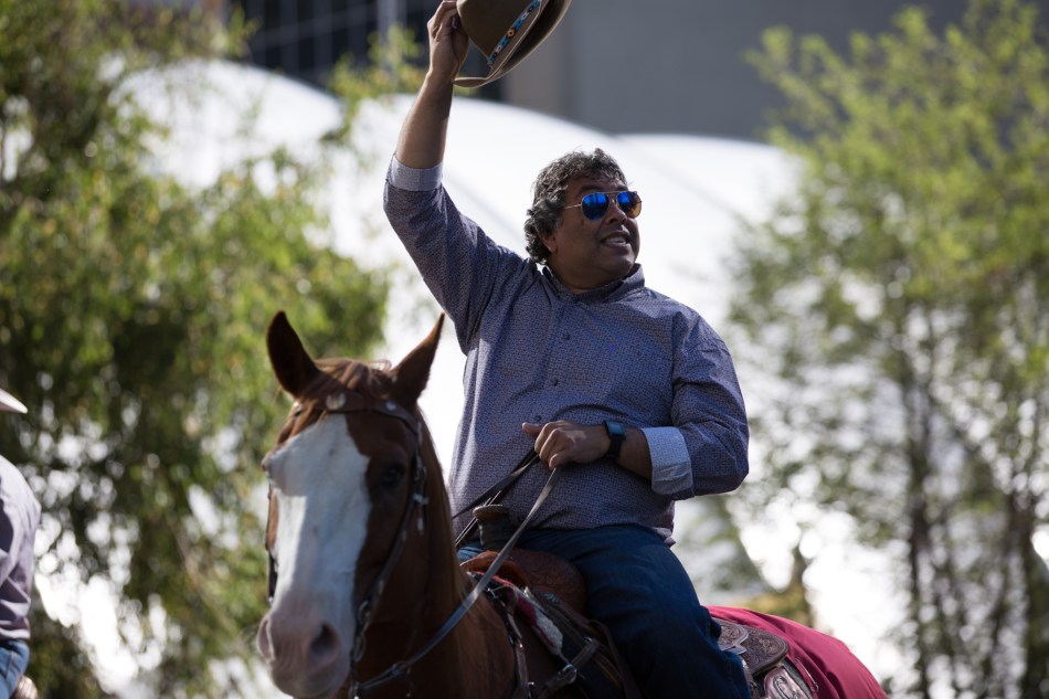 Calgary Mayor Naheed Nenshi riding in the Stampede Parade © J. Ashley Nixon