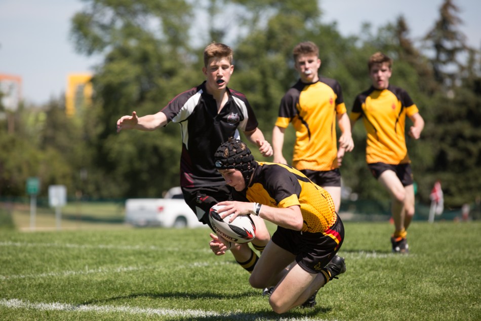 King Henry VIII winger #14 scores one of three tries for his team in the game versus Calgary Mavericks © J. Ashley Nixon
