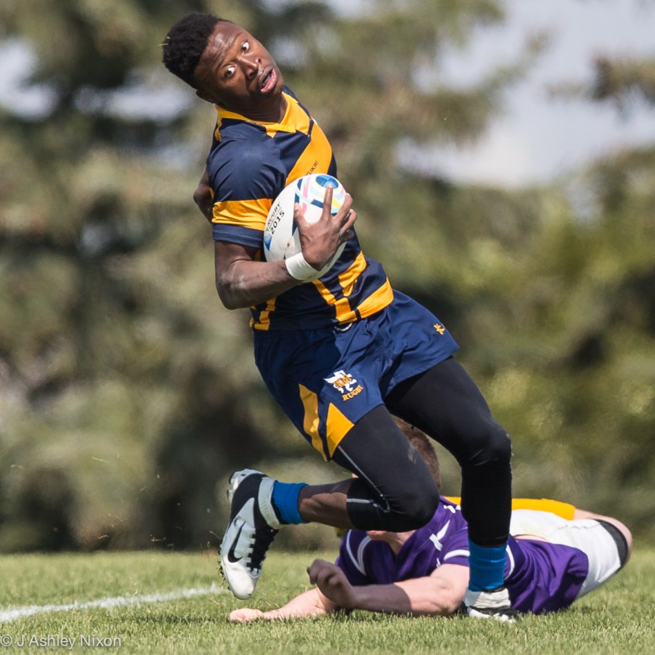 Try scored! Rugby action at Calgary Rugby Union at the Clearwater Cup between Ernest Manning High School Griffins and Lester B. Pearson High School. © J. Ashley Nixon