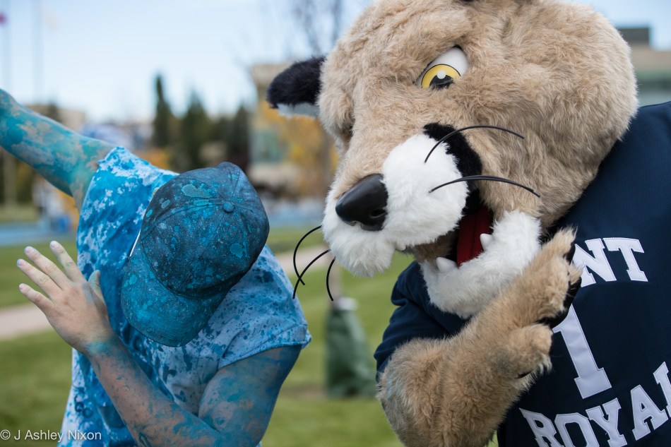 Who leads? Student and Cougar take up dancing at the #colourUblue event, Mount Royal University, Calgary, Canada. © J. Ashley Nixon