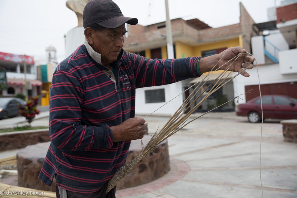 José constructs a reed fishing boat, Caballito de Tora in Huanchaco, Peru. © J. Ashley Nixon