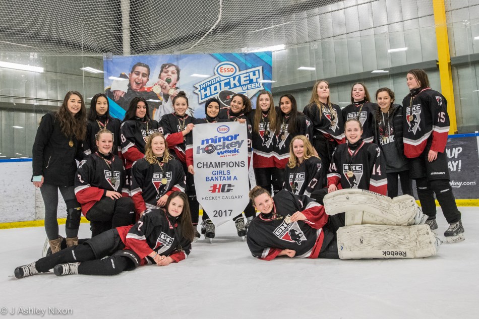 Calgary Girls Hockey White Hawks celebrate their win in the Girls Bantam 1 Final at Max Bell Arena in the Esso Minor Hockey Week tournament, Calgary, Alberta, Canada. © J. Ashley Nixon