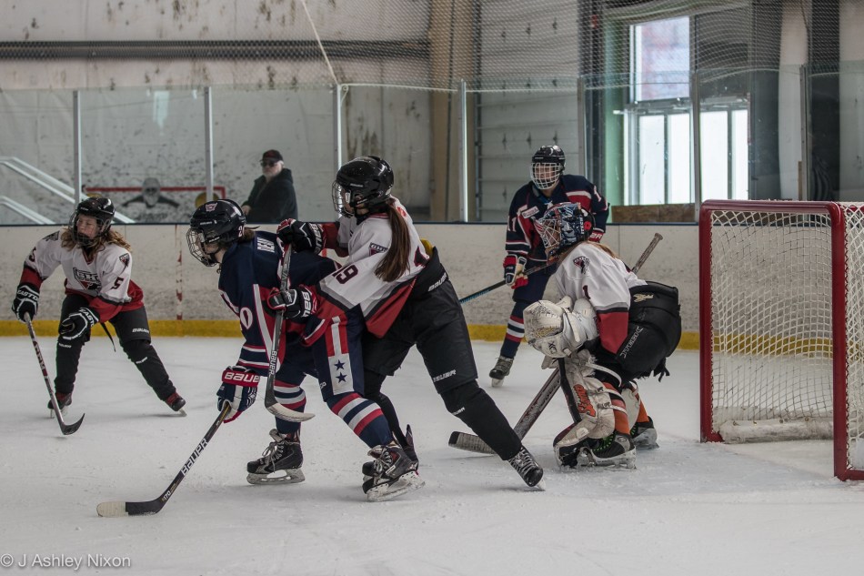 Action between Calgary Girls Hockey Bantam 1 and Coeur D'Alene Hockey Academy at the Northern Rockies Classic in Missoula, Montana, USA © J. Ashley Nixon