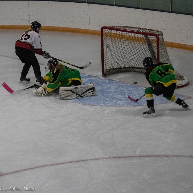 Goal for Calgary Girls Hockey Bantam 1 White Hawks in their game against Okotoks at Stavely Arena, Alberta. © J. Ashley Nixon